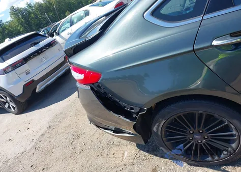 2015 Ford Fusion Titanium z USA, uszkodzony, nr VIN 3FA6P0D94FR175560